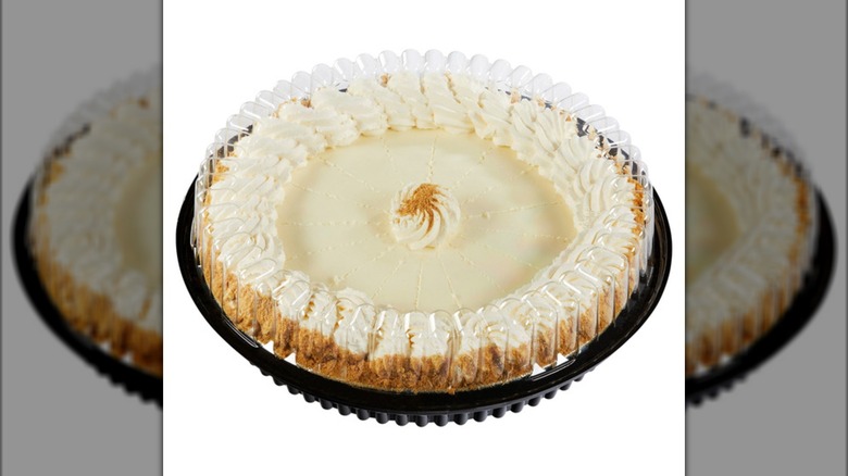 key lime pie with whipped cream in plastic package