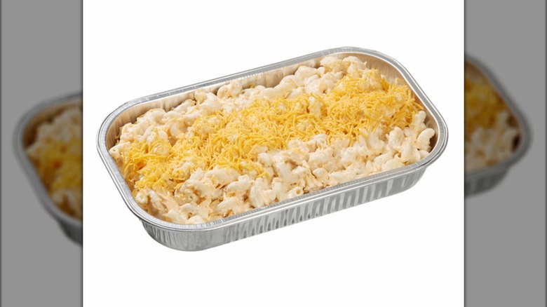 macaroni with shredded cheese in foil pan