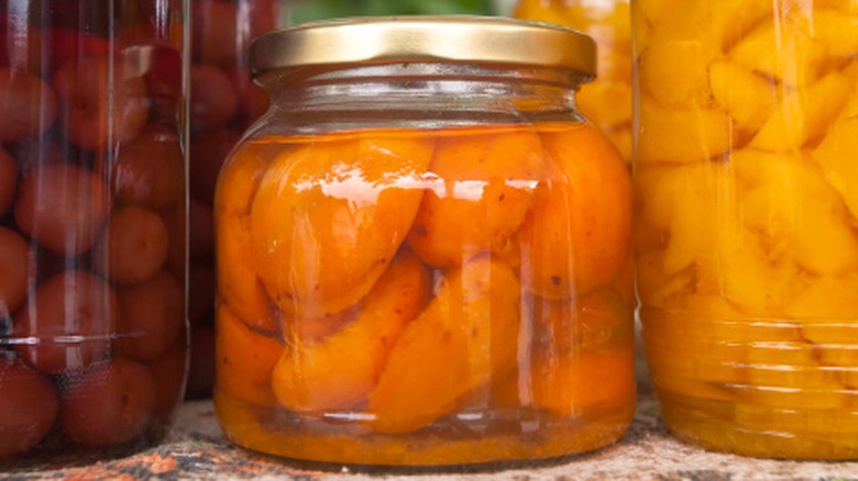 Close-up on jars of canned fruit