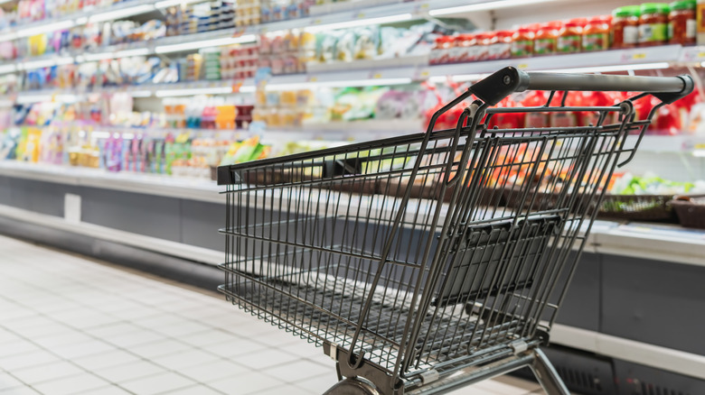 An empty shopping cart in a grocery store