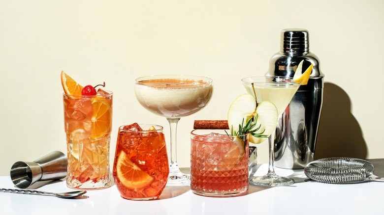 Selection of cocktails against cream backdrop