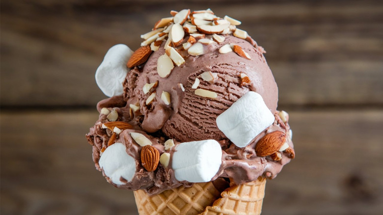 Scoop of Rocky Road ice cream in a cone