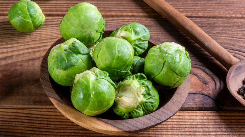 Brussels sprouts in a wooden bowl