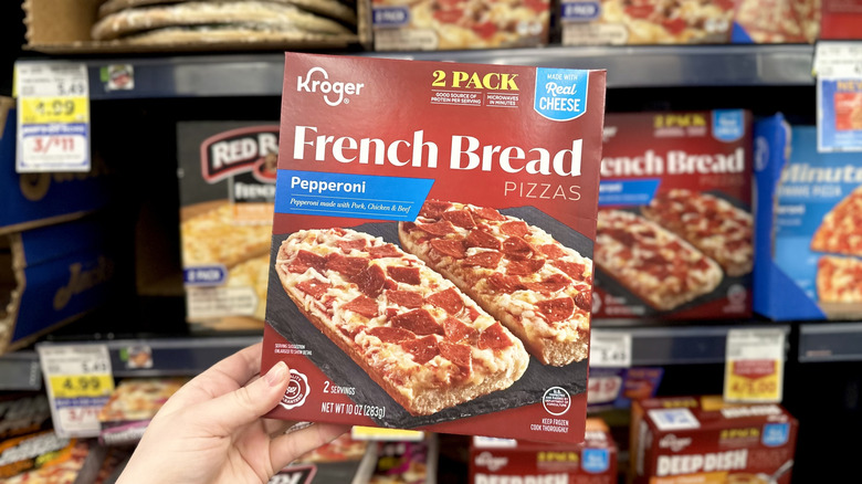 A box of Kroger pepperoni French bread pizzas in the freezer aisle