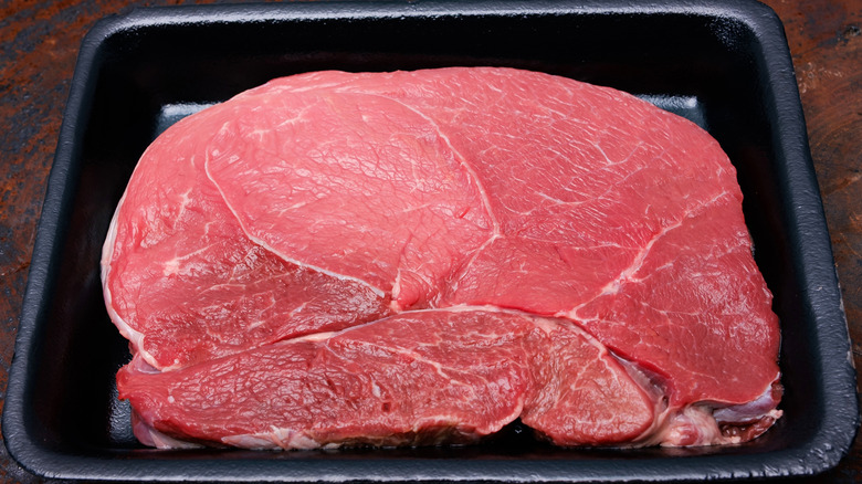 Raw sirloin tip steak
