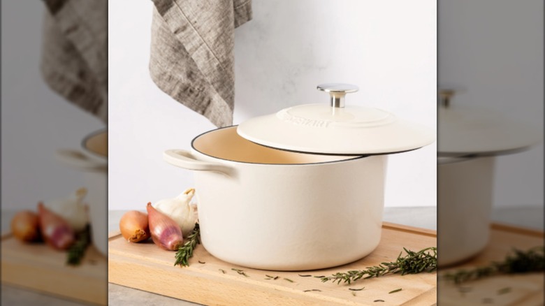 Martha Stewart Dutch oven on a wooden cutting board