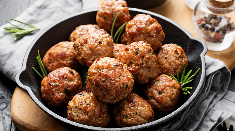 Chicken meatballs in skillet 