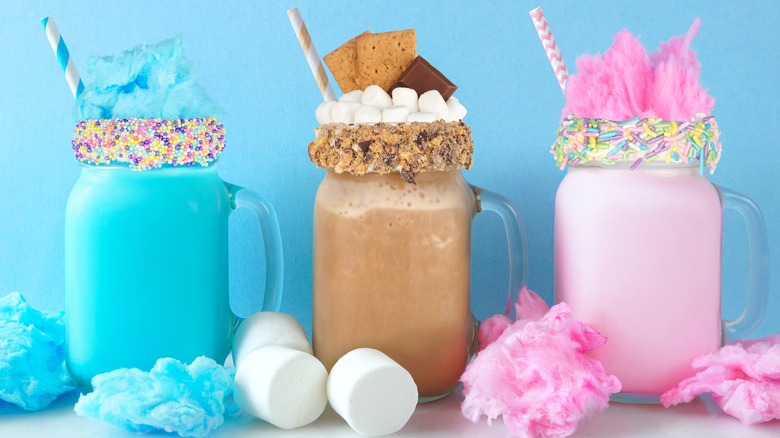 Colorful milkshakes with toppings