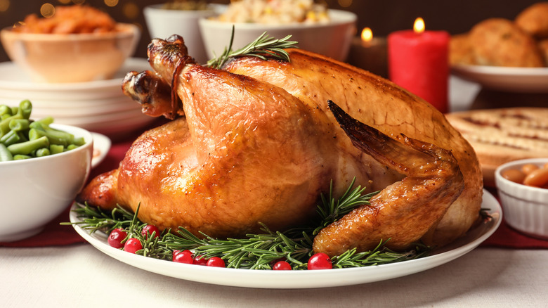 A Thanksgiving turkey served on a dinner table