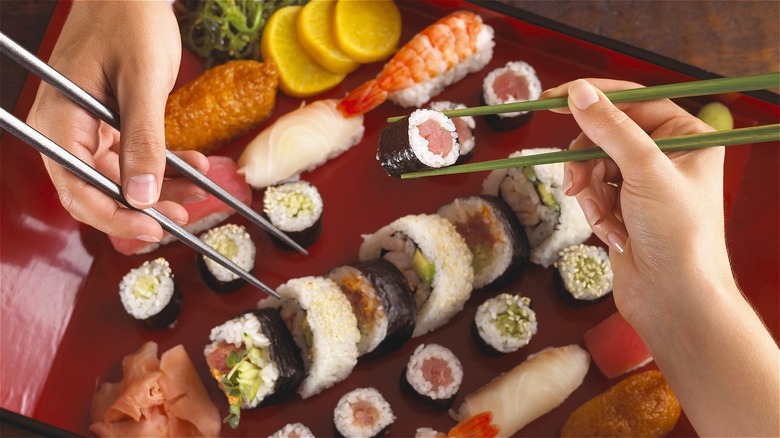 sushi platter with chopsticks