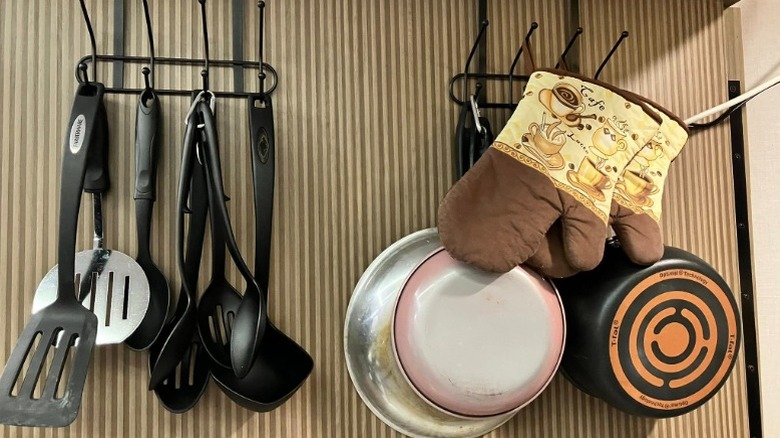 Over-the-door hangers for utensils and pots