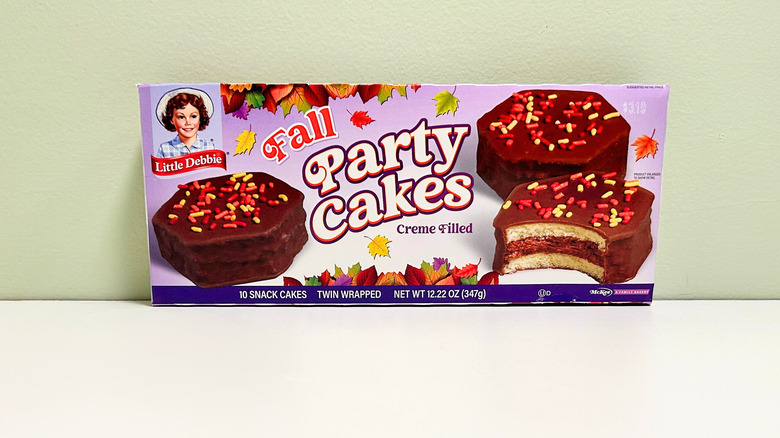 A pack of Little Debbie Fall Party Cakes against a green and white background