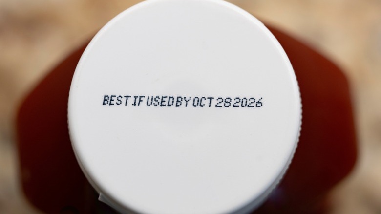 The use-by date on a ketchup bottle lid