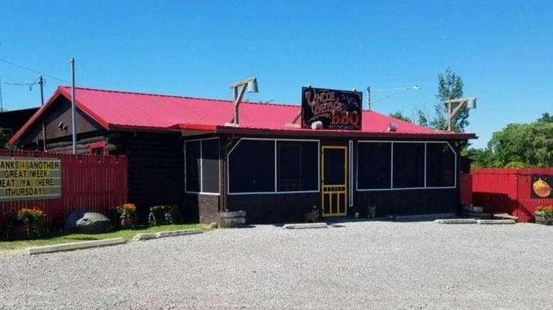Exterior and parking lot of Uncle Beth's BBQ