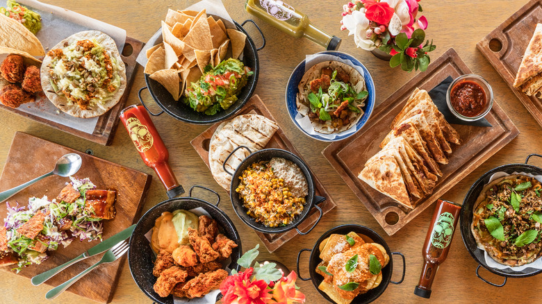 An overhead view of various Mexican dishes