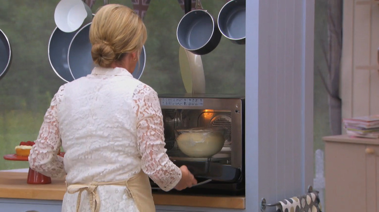 Nancy from series five microwaving her dough to proof