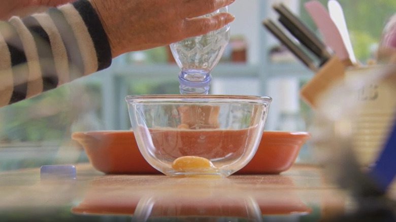 Mary Berry demonstrates her water bottle technique for separating egg yolks