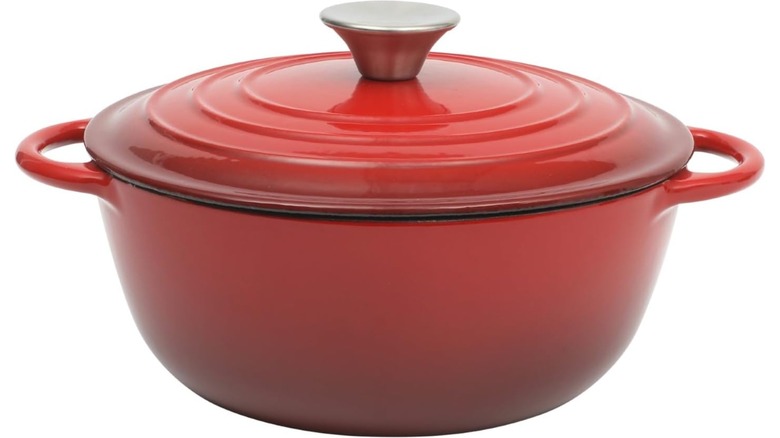 A small red Dutch Oven from Gibson Home against a white background