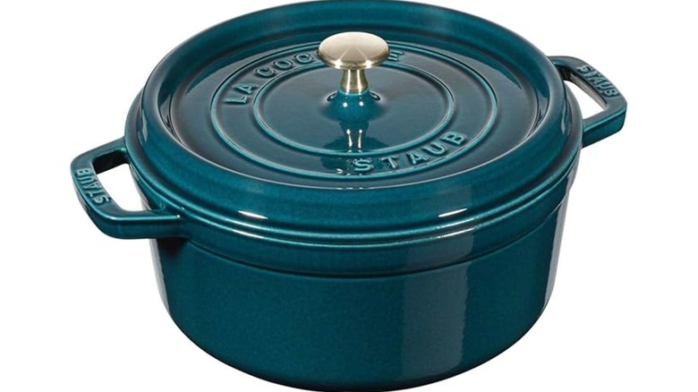 A round, teal blue Dutch oven from Staub