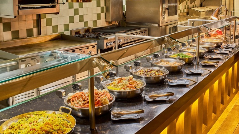A view of the kitchen and hot buffet line at Lucky H Seafood Buffet in Salt Lake City