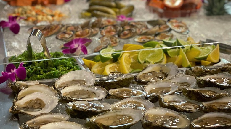 Raw oysters and other seafood on the buffet line at The Nordic restaurant