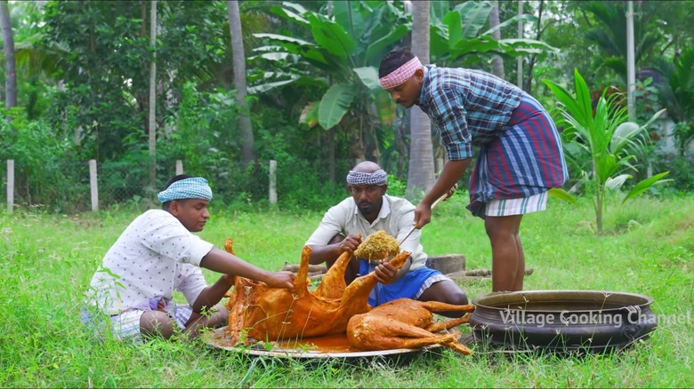 The creators behind Village Cooking Channel prepare a mutton biryani, in a still from a video from the channel