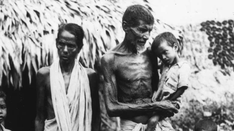 group of severely emaciated people