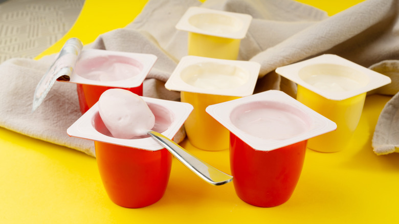 Colorful pots of yogurt