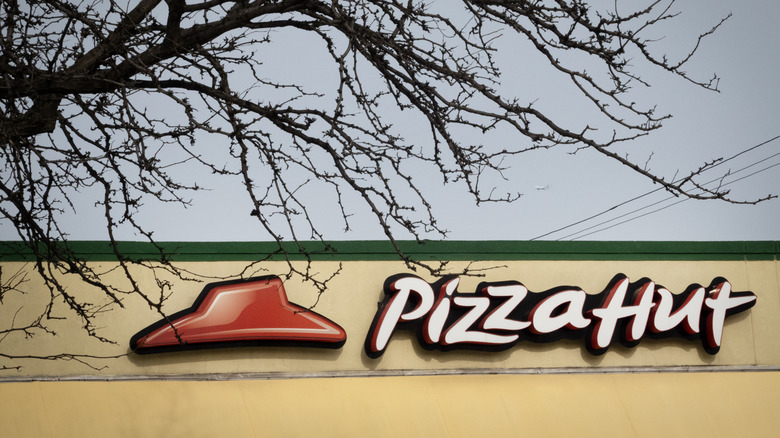 Pizza Hut logo on one of its storefronts