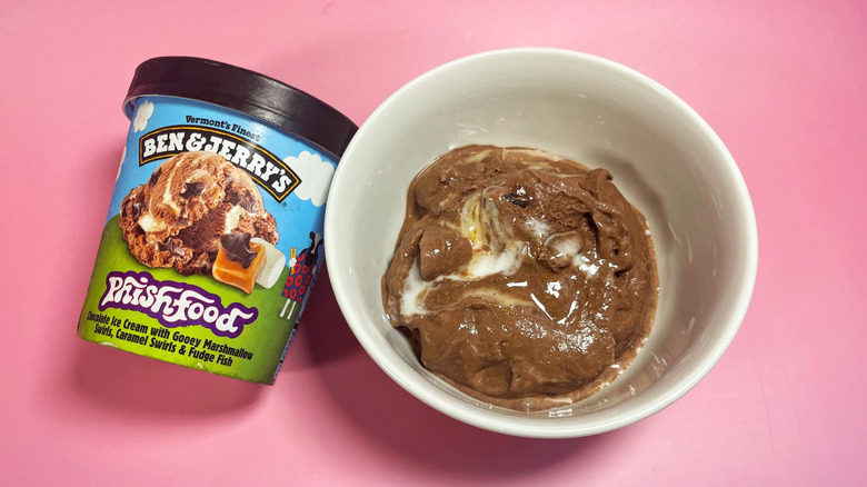 A scoop of Phish Food in a bowl next to its container
