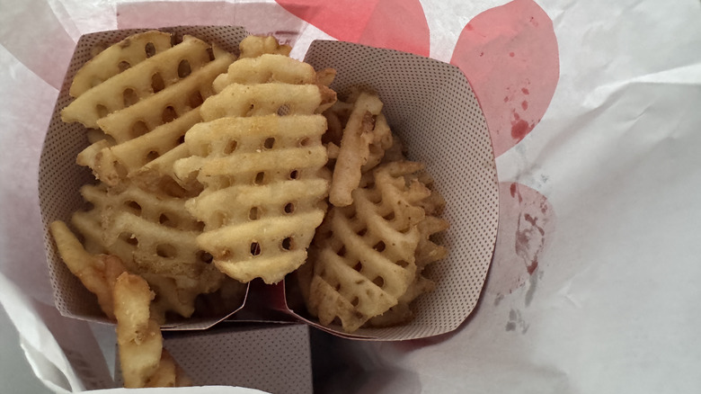 Waffle fries from Chick-fil-A in two separate containers