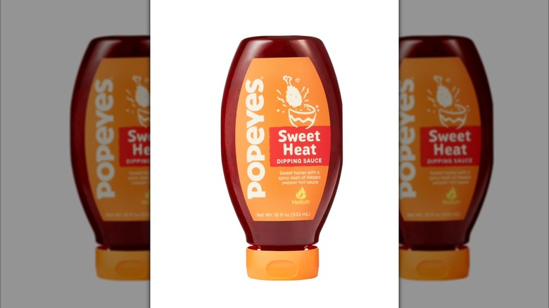 Popeyes sweet heat sauce on white background