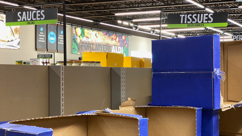 aldi store shelves displaying only empty cartons