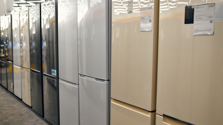 An assortment of new fridges in a showroom