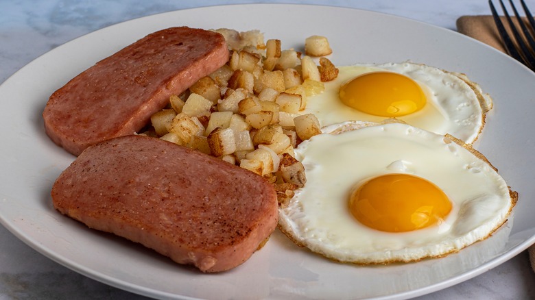 SPAM and eggs, served with hash browns