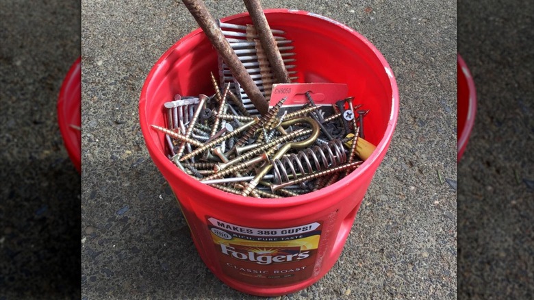 Overhead view of a Folgers cannister full of screws
