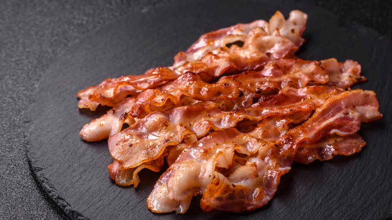 Crispy bacon on a black slate