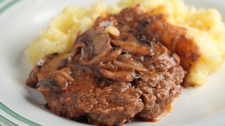 Salisbury steak served with mash potatoes