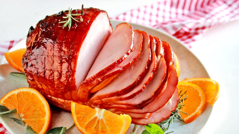 Honey glazed ham, carved into thin slices