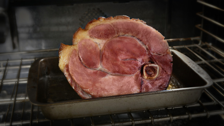 A festive ham cooking in the oven