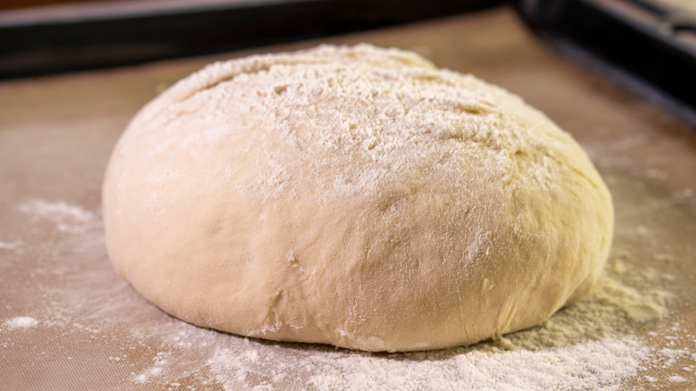 A ball of raw bread dough, ready to bake