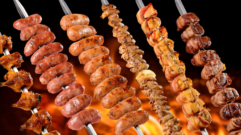 Various Brazilian grilled meats on skewers