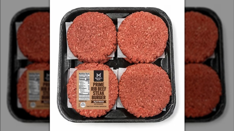 A pack of 8 fresh prime rib ground beef patties, 2 sets of 4 stacked atop each other