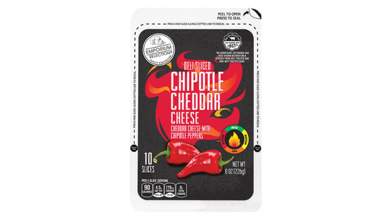 a package of Emporium Selection deli sliced chipotle cheddar cheese against a white background