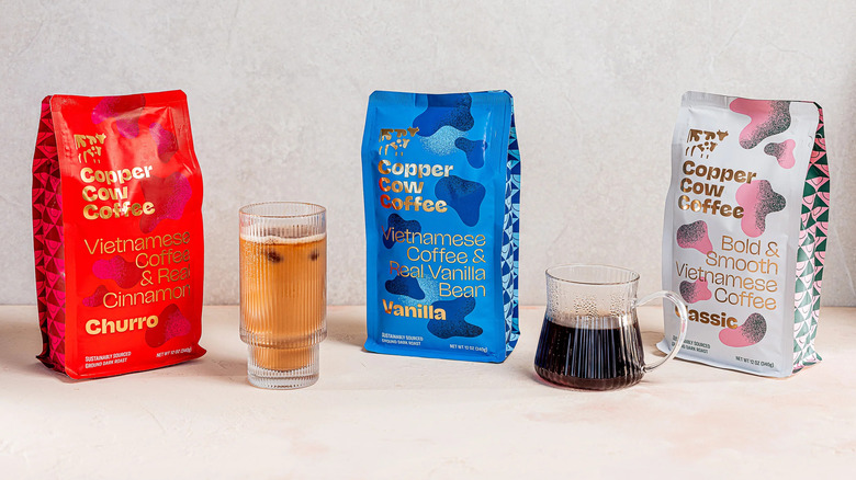 Three bags of flavored copper cow coffee with breweed coffee