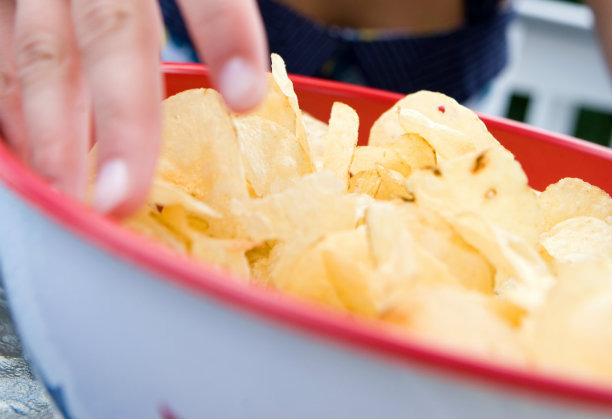 Dirty Hands in Snack and Candy Bowls