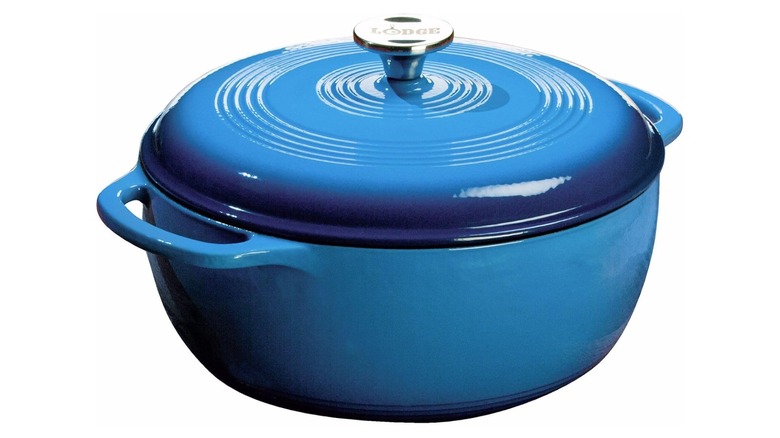 A light blue Lodge Dutch oven