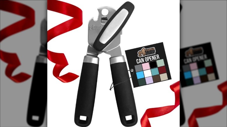 A Gorilla Grip Can Opener with a tag and red ribbon against a white background
