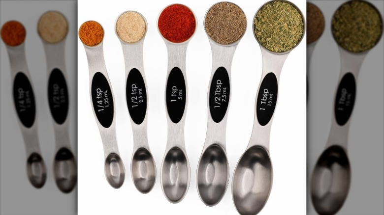 Set of Formannie Magnetic Measuring Spoons lined up against a white background