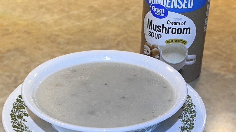 Great Value condensed cream of mushroom soup in bowl next to can